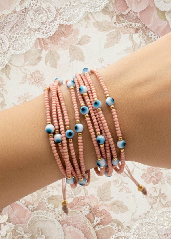 Pulsera de hilo Ojitos / Chapa de Oro 14k